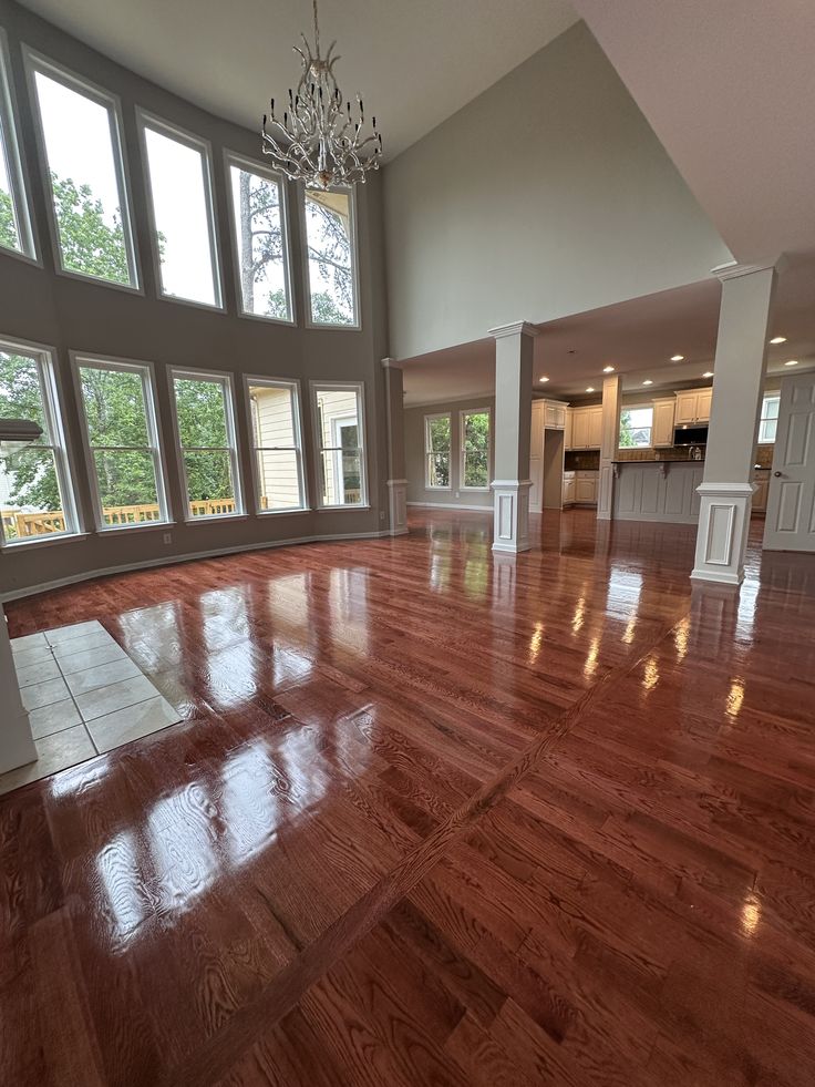 High-gloss hardwood flooring installation in a Mississauga home